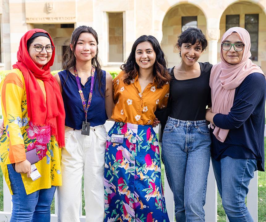 5 women smiling in the Great Court.
