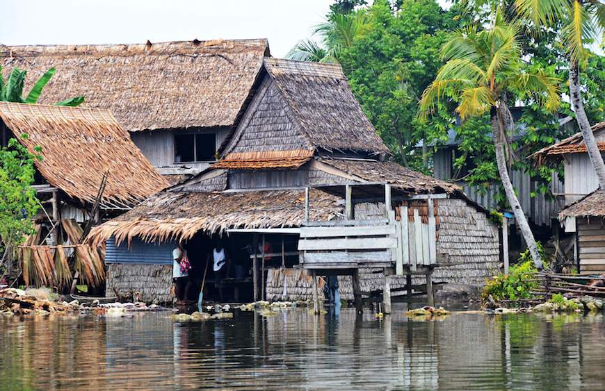 King tides lap at the doorstep of houses in Roviana Lagoon, Solomon Islands, in January 2017.