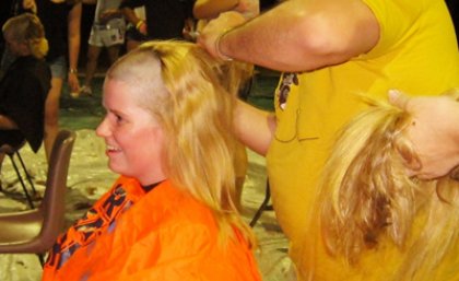 Katie Roberts having her head shaved for a good cause