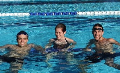 UQ students, from left, Diogo Costa, Erin Duddy and Boyd Watson enjoy the new pool.