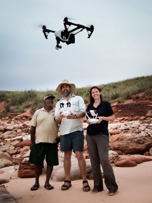 Goolarabooloo Law Boss Phillip Roe, Dr Steve Salisbury and Linda Pollard use the dino-drone. Photo: Damian Kelly.