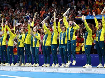 The Australian women's water polo team celebrate after winning a silver medal in Paris