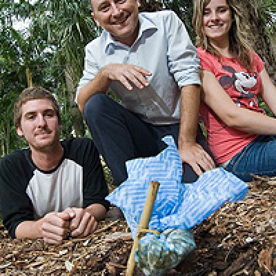 Dr Robbie Wilson (centre) and students Eddie White and Estelle Van Der Linde with dung beetle collection kits