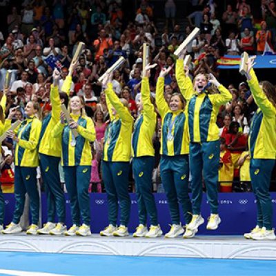 The Australian women's water polo team celebrate after winning a silver medal in Paris