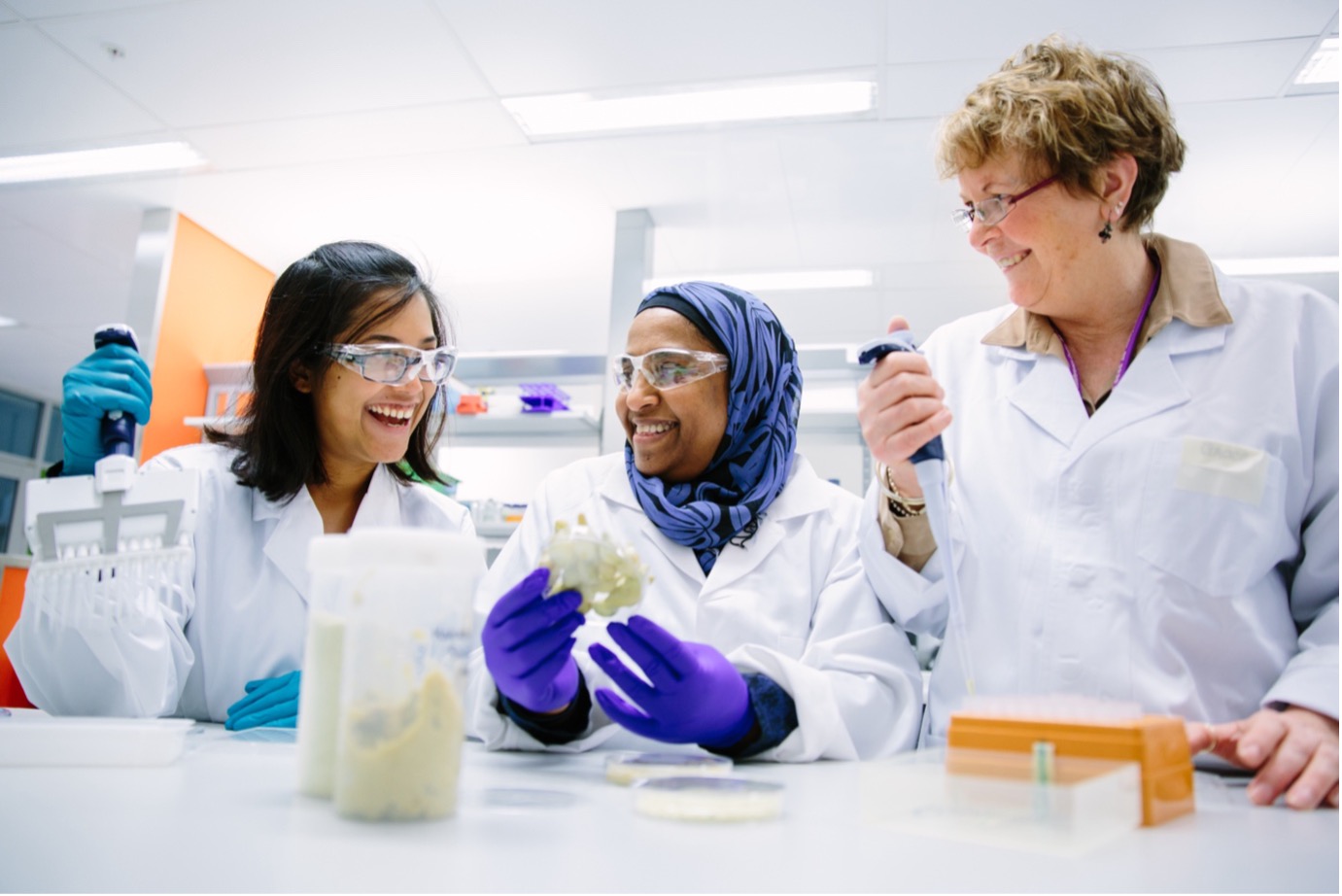 Female researchers including Yasmina Sultanbawa in a lab